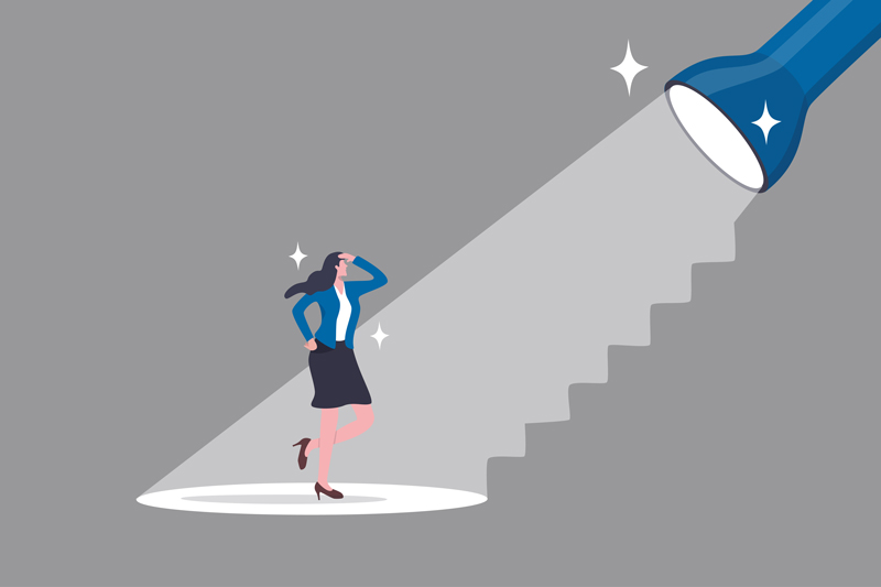 woman standing under flashlight looking up towards a staircase symbolizing opportunity and progress in life